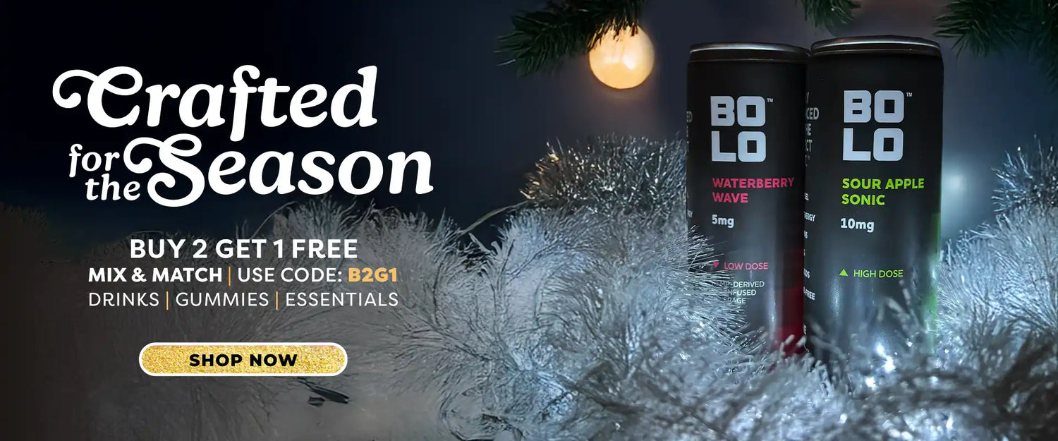Two cans of Bolo drinks with holiday decorations and text overlay on a dark background.