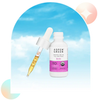 Aspen Green Bliss CBD Oil tincture bottle with a dropper leaning against the bottle.