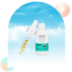 Aspen Green Extra Mint CBD Oil tincture bottle with a dropper leaning against the bottle.