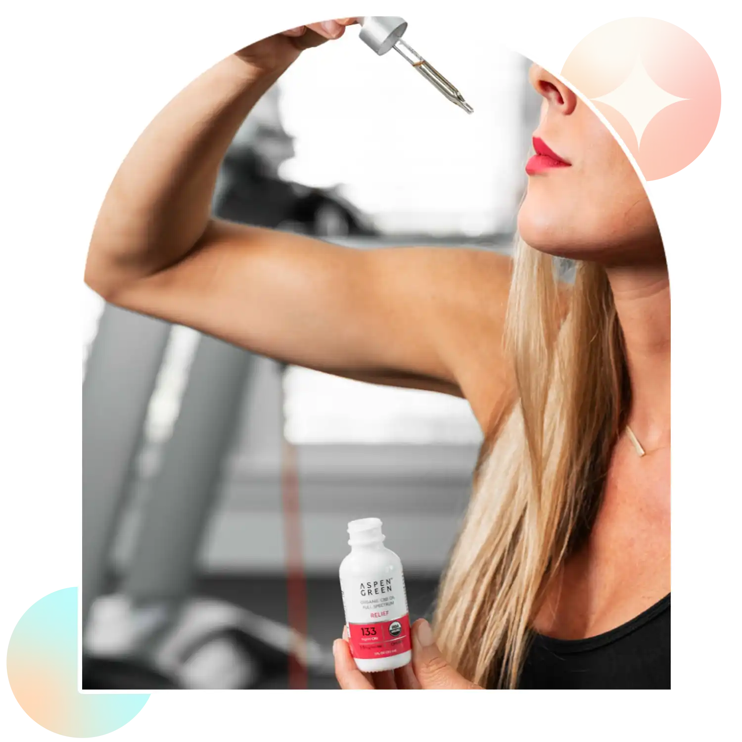 Woman taking Aspen Green Relief CBD Oil by dropper