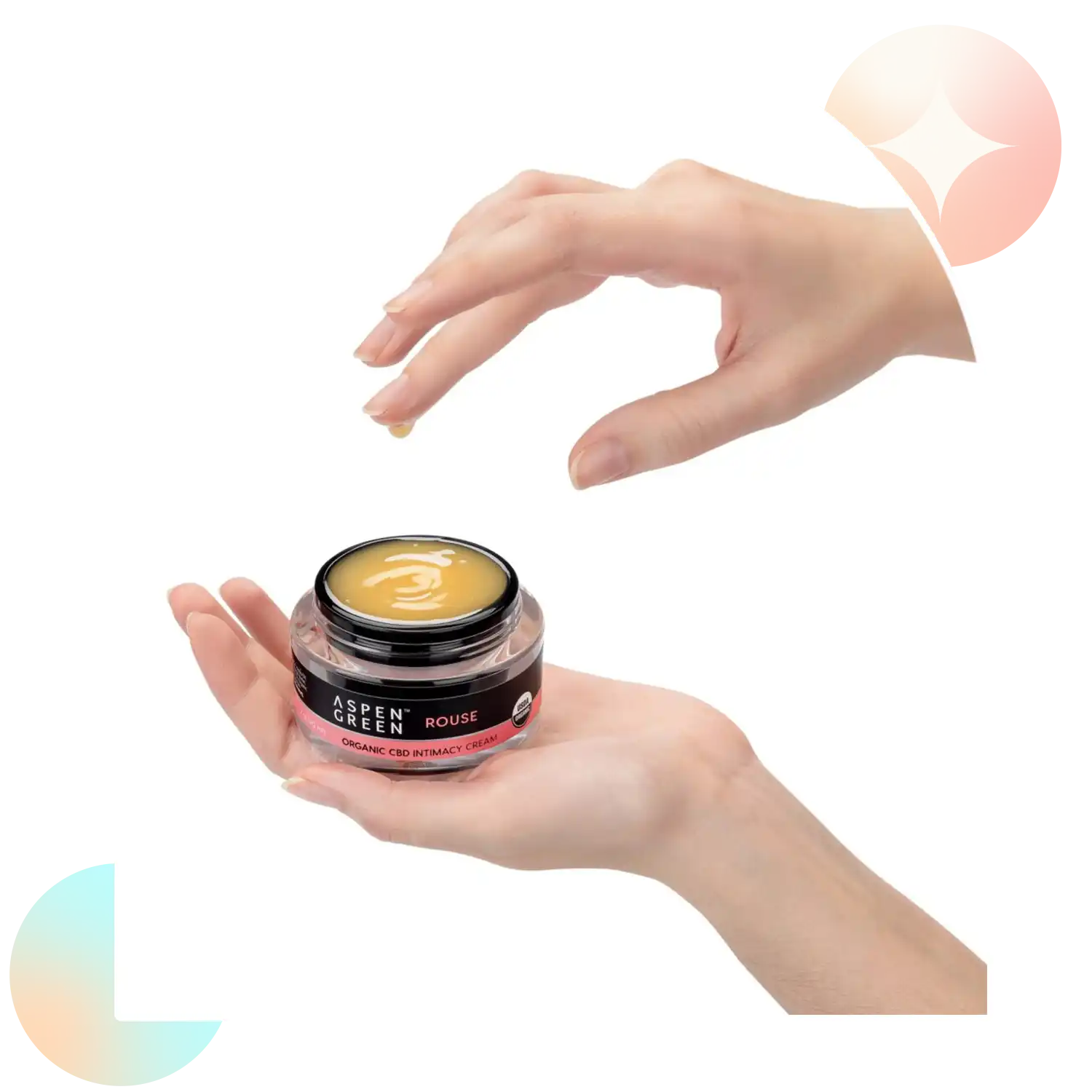 Aspen Green Rouse Full Spectrum CBD Intimacy Cream - Hand reaching for an open container