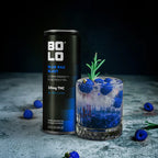 BOLO Blue Raz Blast THC drink can with glass of raspberry flavored beverage and fresh raspberries